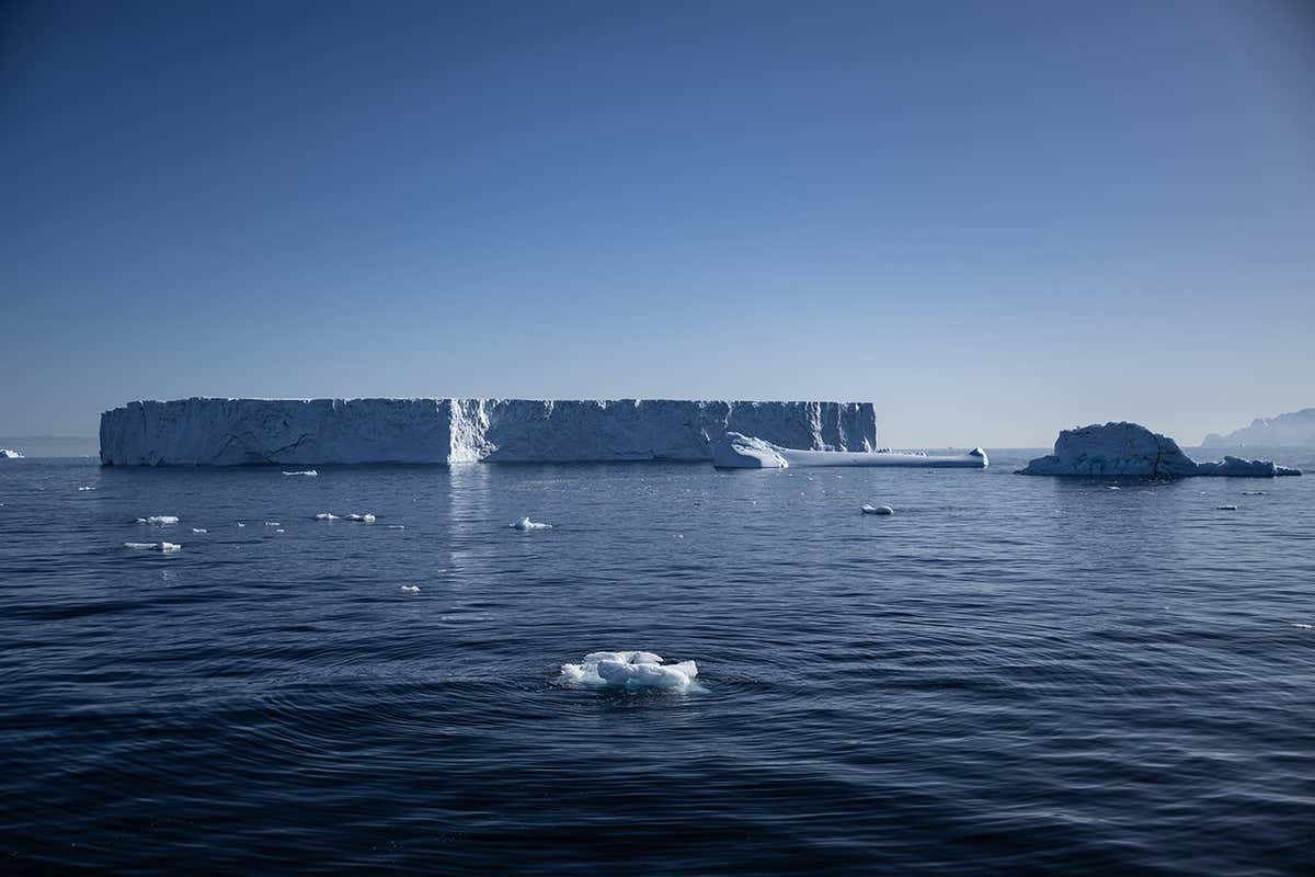 ANTARCTICA - FEBRUARY 15: Melting icebergs are seen on Horseshoe Island as Turkish scientists conduct fieldwork on Horseshoe Island within 7th National Antarctic Science Expedition under the coordination of the Scientific and Technological Research Council of Turkiye (TUBITAK) MAM Polar Research Institute with the joint responsibilities of the Turkish Presidency and Turkish Ministry of Industry and Technology in Antarctica, on February 15, 2023. Turkish scientists sailed with the 80-meter Chilean-flagged research ship 'Betanzos' for nearly a month as part of the 7th National Antarctic Science Expedition. During the voyage, Turkish scientists arrived at Horseshoe Island via a new transit channel developed in the Gullet and Barlas Channel, which was previously covered in ice due to melting sea ice caused by global climate change. The minimum width of sea ice in Antarctica for 2023 fell to 1.79 million square kilometers, the lowest level on record, on February 21. While this data is 1.05 million square kilometers below the 1981-2010 average, it also points out that a new record decrease is experienced every year. (Photo by Sebnem Coskun/Anadolu Agency via Getty Images)